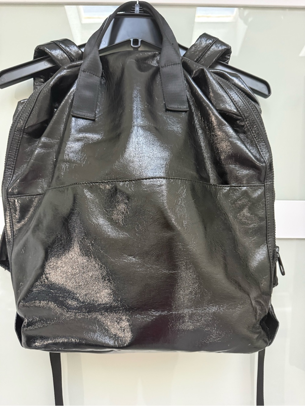 Sleek Shiny Black Leather Backpack
